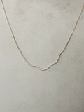 Wavy Necklace w White Zirconias