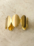 Ellipse Form Brushed Gold Bangle Bracelet